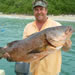 Here in Playa Conchal, Mr. Dale Hooker with his dream, a cubera snapper caught on the nearby Catalinas islands