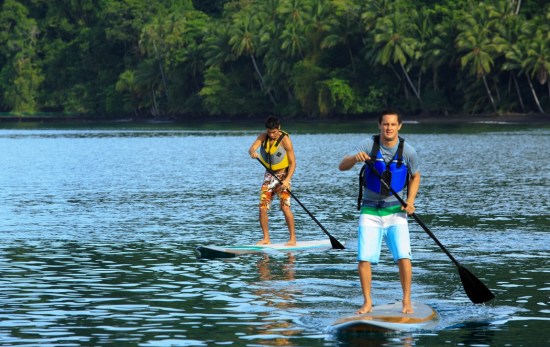 paddleboarding on a luxury boat tours in Flamingo Costa Rica