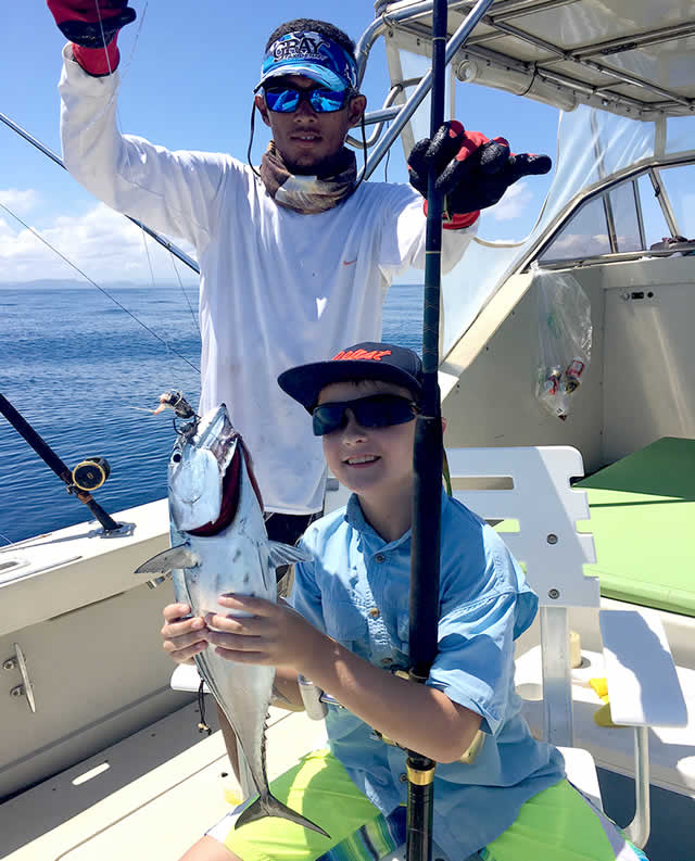 Andrew Hoggatt son fishing on the Captain Nayo boat